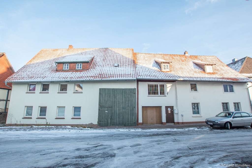 Immobilie in Rollshausen - 2x Einfamilienhäuser mit Entwicklungspotenzial – Teilvermietete Kapitalanlage in Rollshausen! - Bild 1