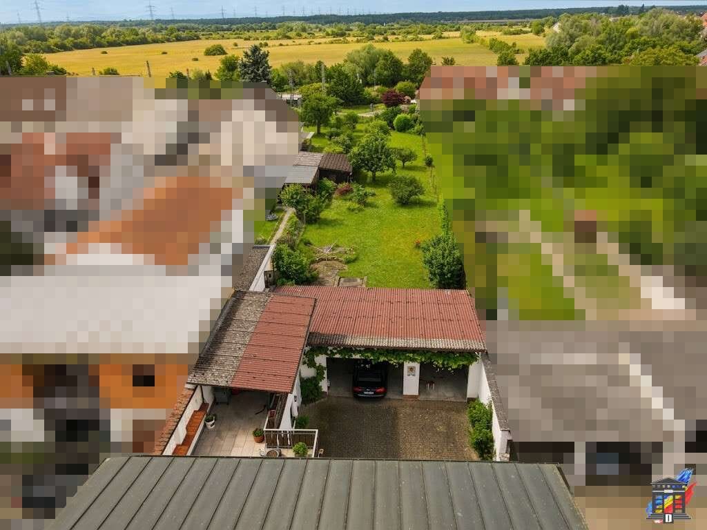 Immobilie in Ubstadt-Weiher - Vielseitiges Dreifamilienhaus mit großem Garten - bezugsfrei - Bild 1