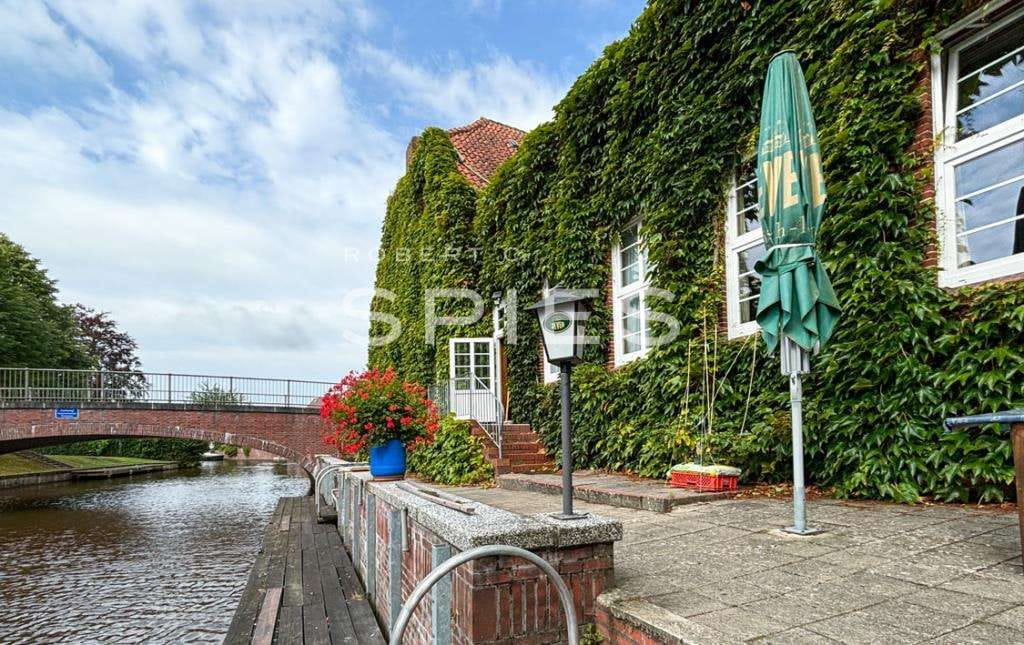 Immobilie in Hinte - Gaststätte mit Saal und Zimmervermietung in direkter Wasserlage am "Knockster Tief" Nähe Emden - Bild 0