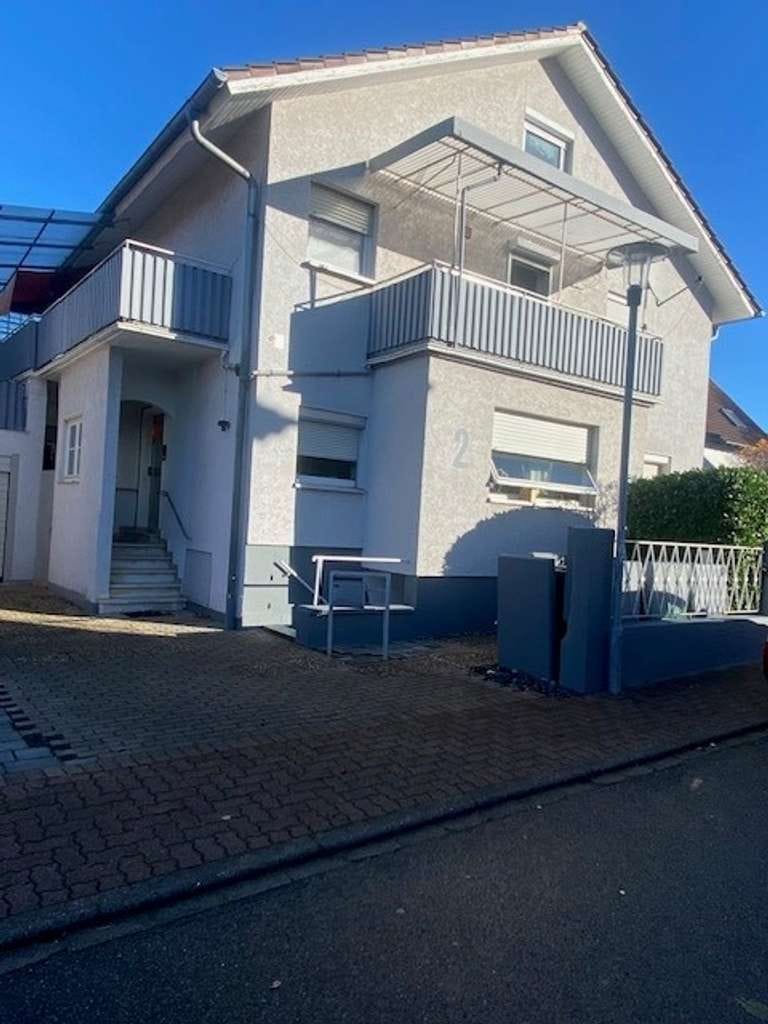 Immobilie in Nußloch - Nussloch interessantes 3 Familien Haus mit zusätzlicher Gewerbeeinheit - Bild 0