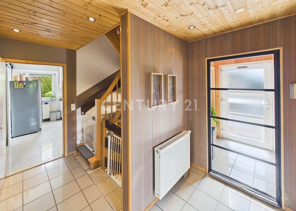 Immobilie in Hornbach - Ein Zuhause zum Verlieben – Freistehendes Familienhaus mit Wintergarten und Traumgarten - Bild 1