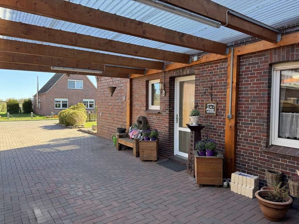 Immobilie in Südbrookmerland - Großzügiges Einfamilienhaus mit Wintergarten, schönem Garten und Garage in Sackgassenlage - Bild 2