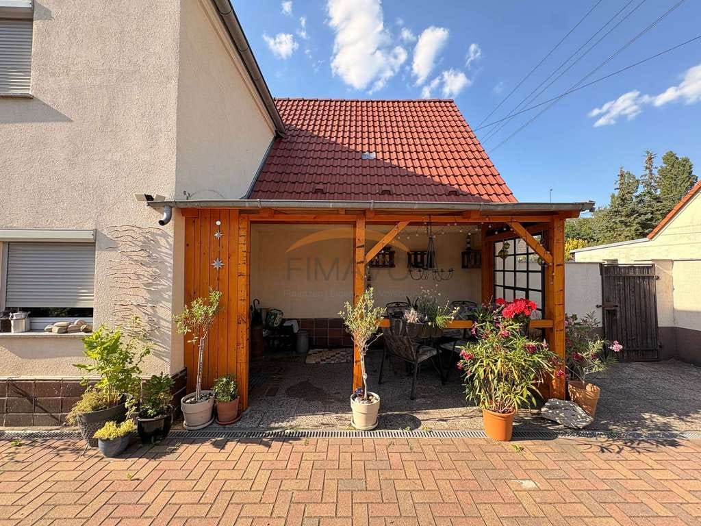 Immobilie in Lauchhammer - Familienfreundliches Einfamilienhaus mit großem Grundstück, Kamin, Nebengebäuden und viel Potenzial - Bild 2