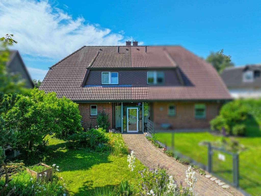 Immobilie in Brunsbek - ! Neu ! 22946 Brunsbek: Gepflegte Doppelhaushälfte mit Carport und Sauna - Bild 2