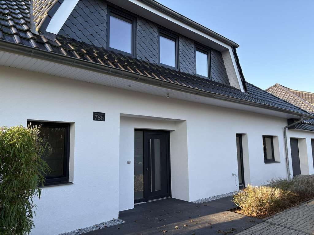 Immobilie in Jersbek - Modernes Zweifamilienhaus bei Hamburg|268m2|Bj.2016|A+|2WE - Bild 1
