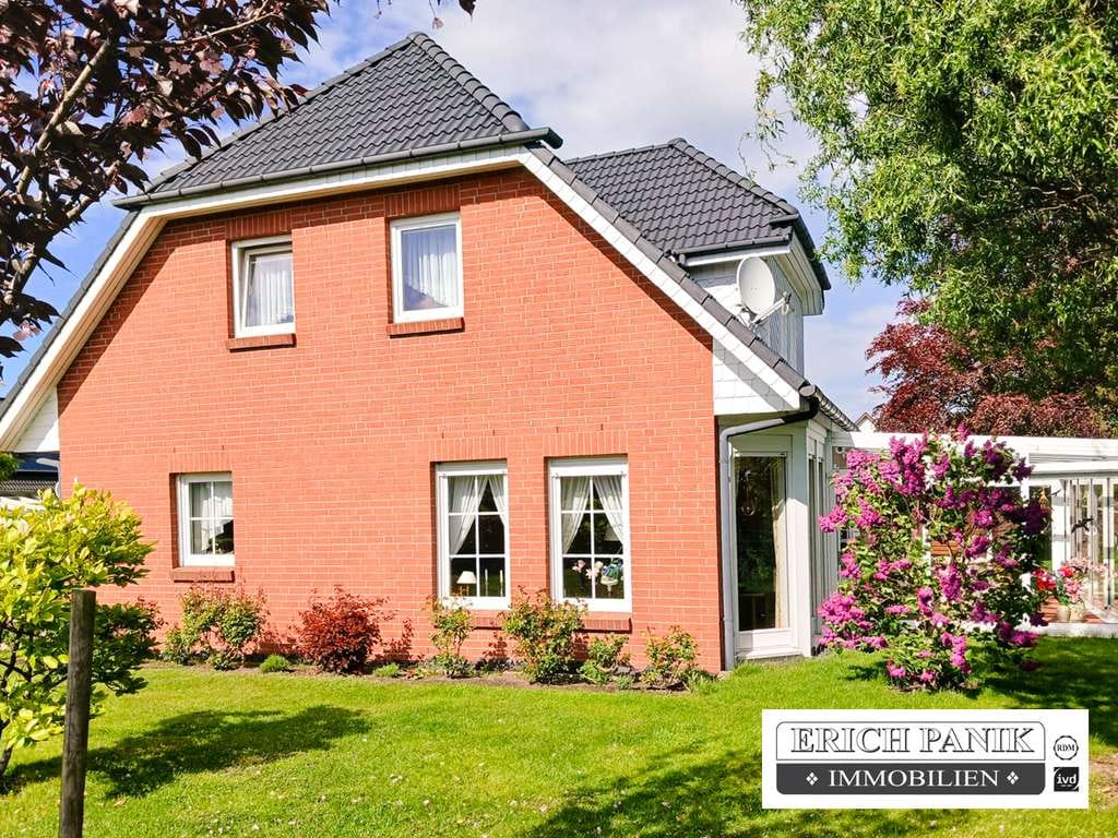 Immobilie in Bentwisch - Familienfreundliches Einfamilienhaus mit Wintergarten,  Doppelgarage & traumhaftem Garten  in Bentwi - Bild 1
