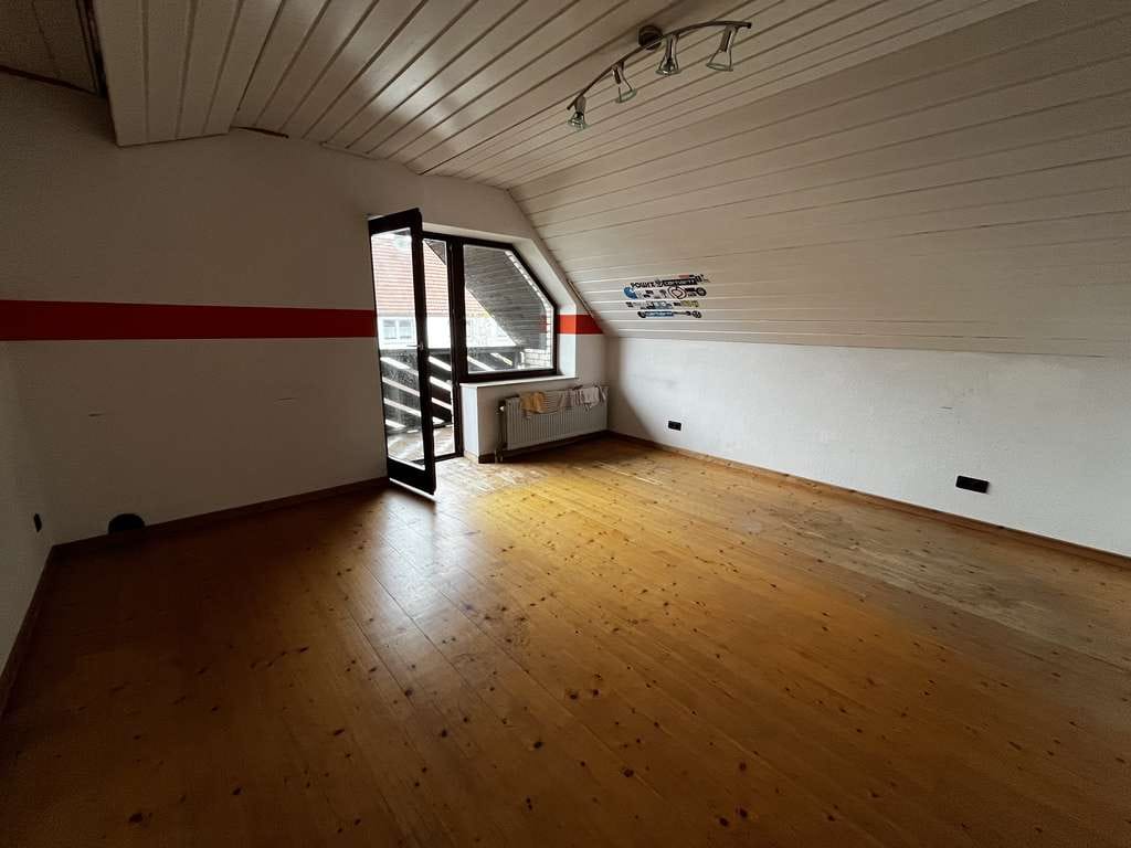 Immobilie in Borgentreich - Familienfreundliches und großzügiges Einfamilienhaus mit Terrasse und Balkonen - Bild 4
