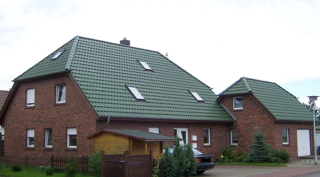Immobilie in Dranske - Einfamilienhaus mit Einliegerwohnung + Garage - Bild 0