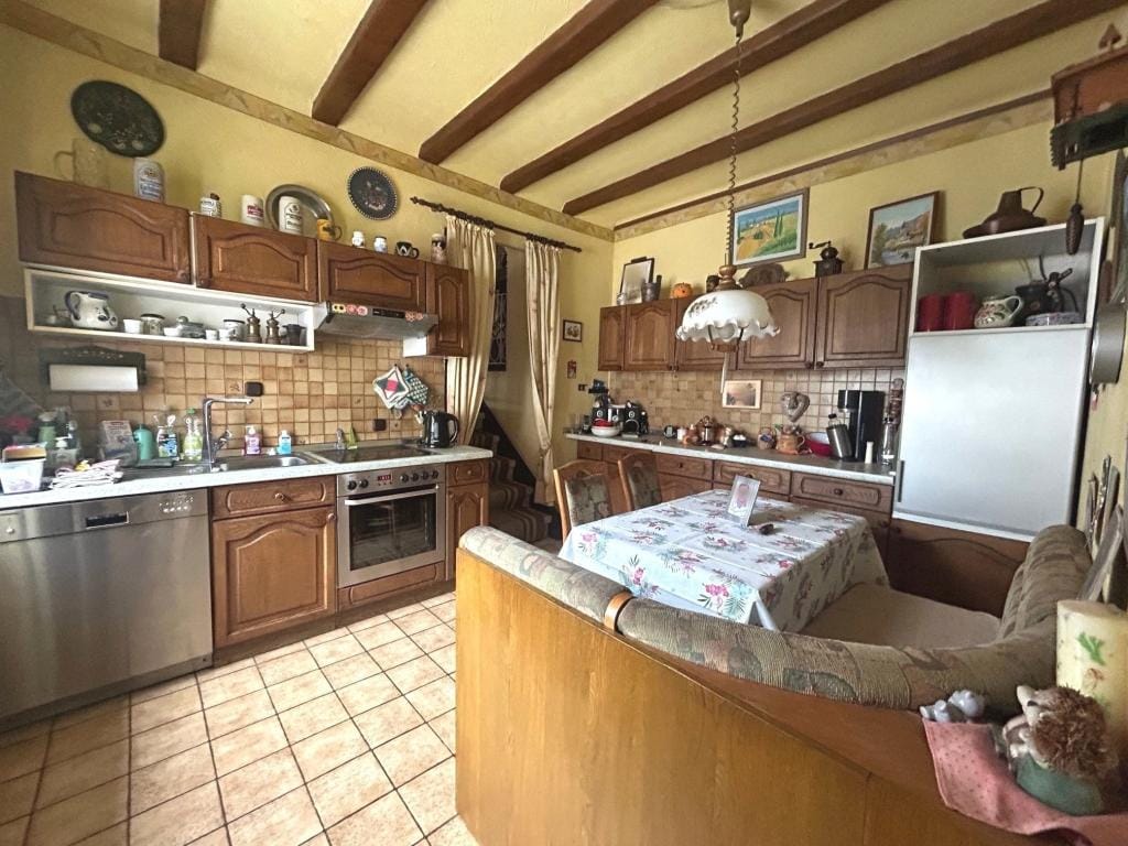 Immobilie in Ottweiler - Vielfältiges Wohnhaus mit großem Grundstück und Garage in ruhiger Wohnlage von Ottweiler! - Bild 2