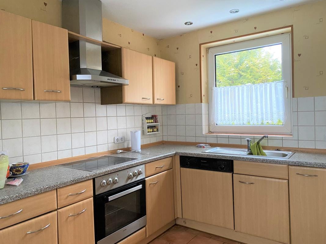 Immobilie in Papenburg - Einfamilienhaus mit großem Grundstück
in Kanallage von Papenburg-Obenende - Bild 3