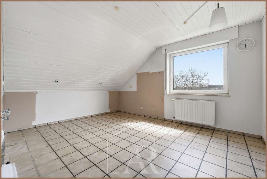 Immobilie in Niederzier - Ruhig gelegene Dachgeschosswohnung mit Garage in Oberzier! - Bild 4