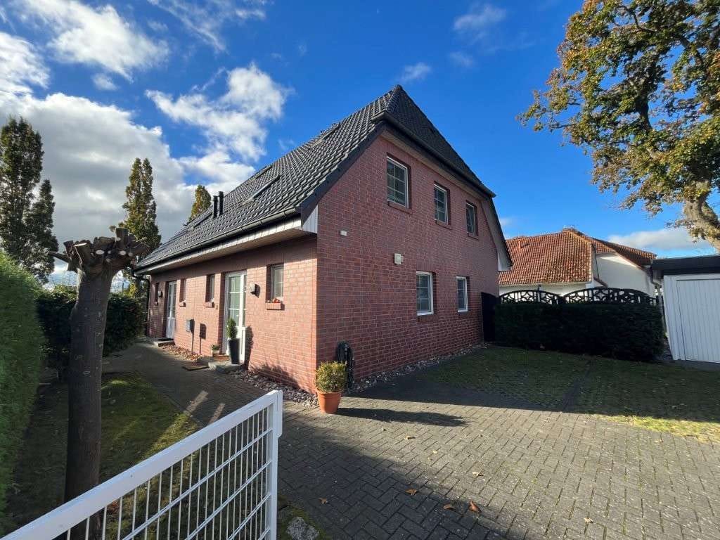 Immobilie in Zingst - Zweifamilienhaus in Zingst, Eigennutzung mit sicherem Mietvertrag - Bild 1