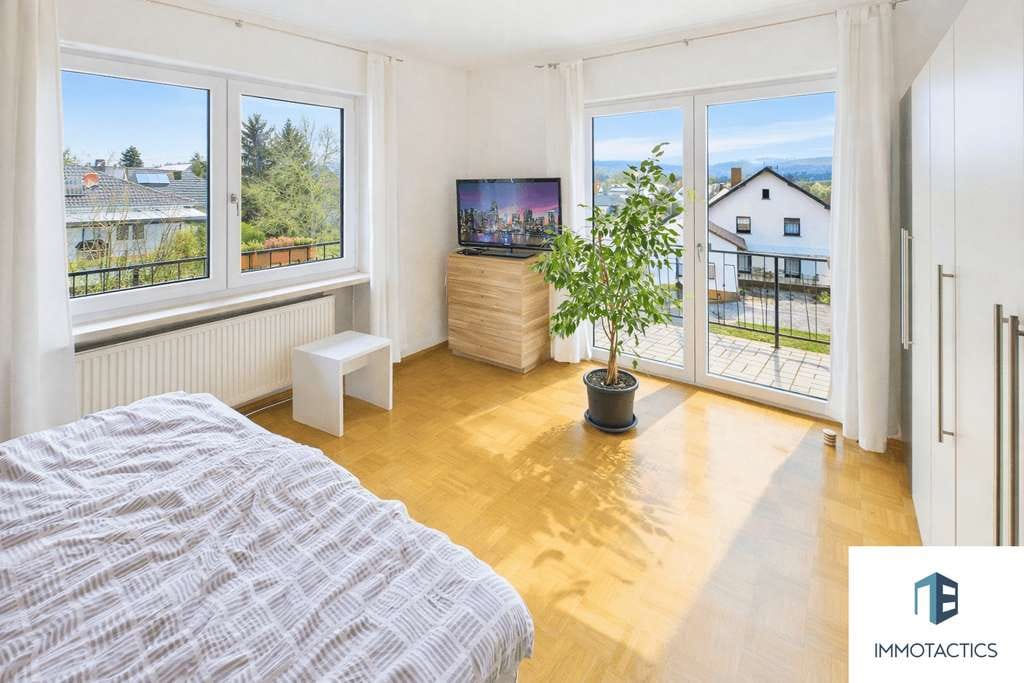 Immobilie in Guldental - Einfamilienhaus mit umlaufendem Balkon und zwei großen Maxi-Garagen und Weitblick in Guldental - Bild 1