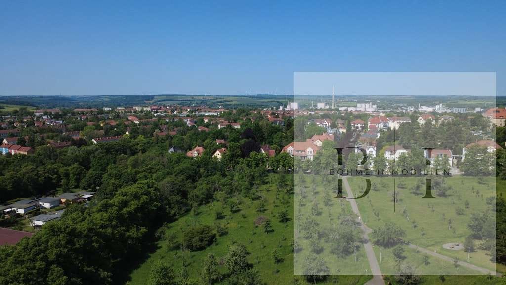 Immobilie in Zeitz - Kapitalanlage mit Entwicklungspotential – Mehrfamilienhaus mit 9 Garagen und 6 Stellplätzen - Bild 4