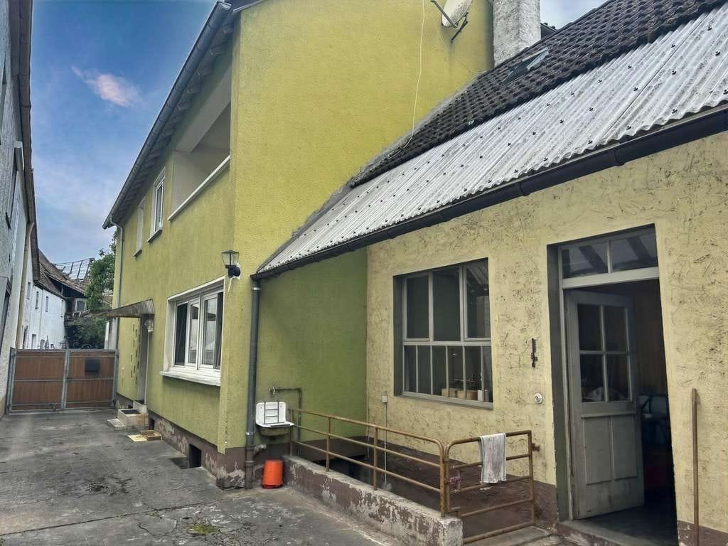Immobilie in Bellheim - Viel Platz für Hobby oder Beruf - Einfamilienhaus mit Hof, Garage und Werkstatt - Bild 1