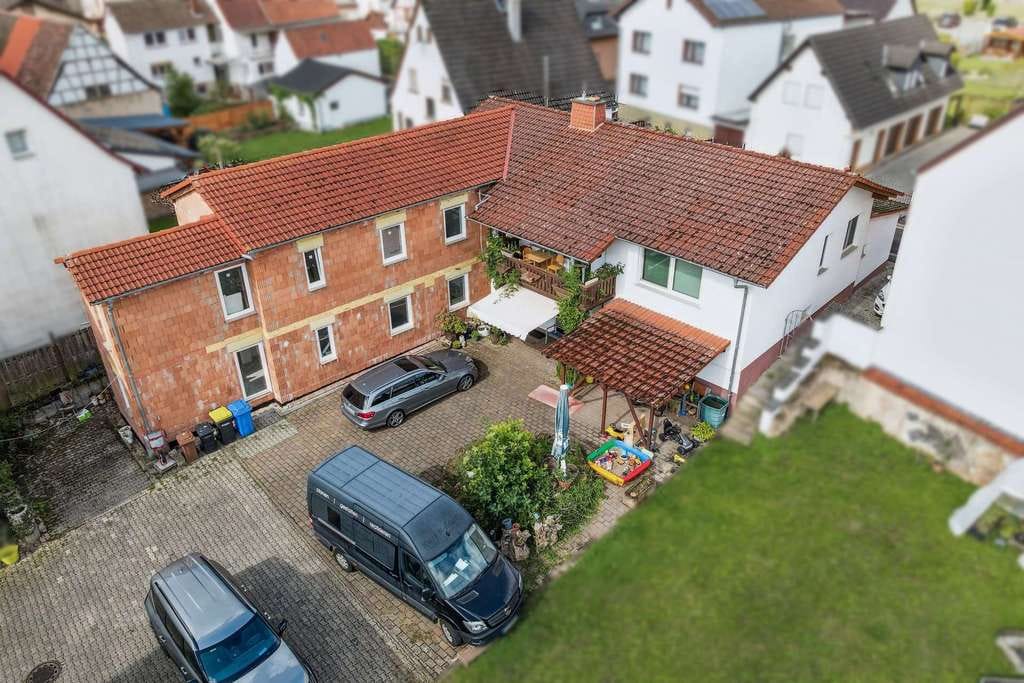 Immobilie in Gründau - Einfamilienhaus mit Anbau im schönen Hain-Gründau - Bild 0