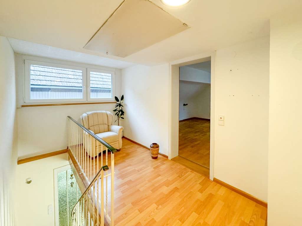 Immobilie in Sasbach am Kaiserstuhl - Historischer Charme auf zwei Ebenen –   Maisonettewohnung im Gebäudeensemble mit Garage - Bild 3