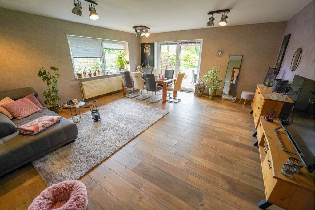 Immobilie in Geestland - Haus mit Garten und Garage in ruhiger Lage Geestland/Langen - als Wohnungseigentum (WEG) - Bild 1