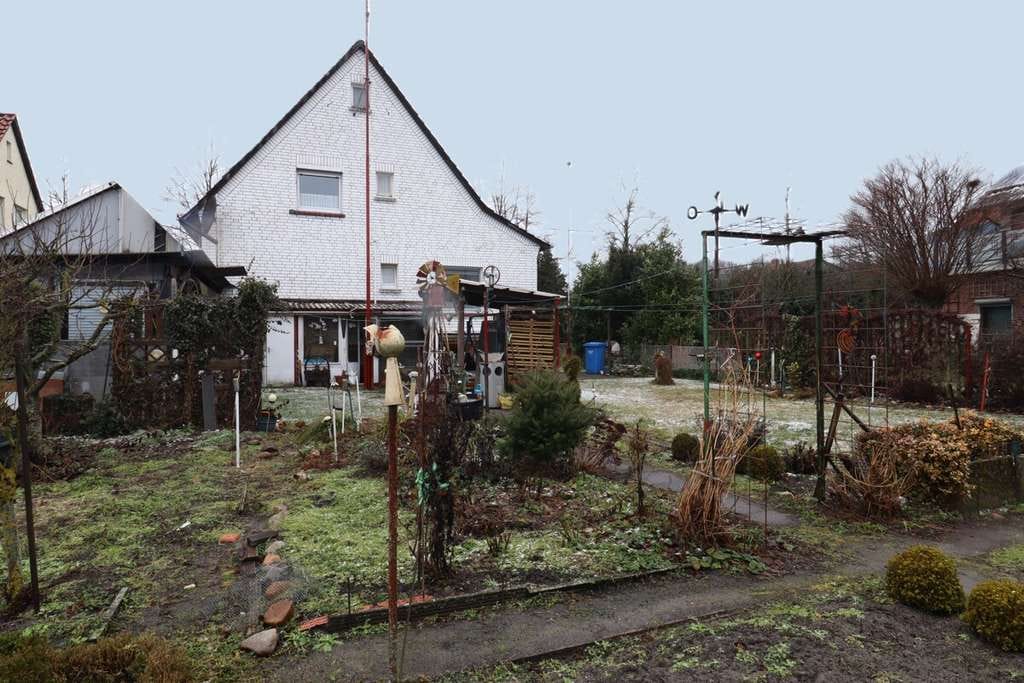 Immobilie in Meine - Gepflegtes EFH mit Kamin, Keller, Garage und schönem Garten - Bild 2