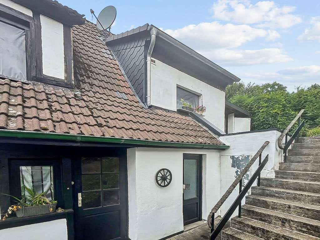 Immobilie in Gummersbach - Kapitalanlage oder Eigennutzung - Reihendendhaus mit Fachwerkcharme in ruhiger Lage von Gummersbach - Bild 0