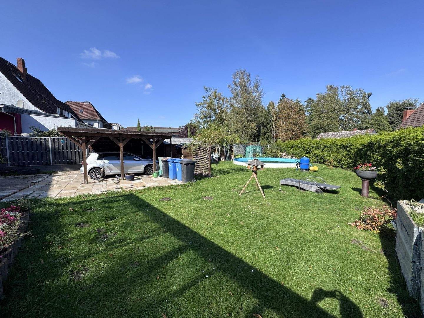Immobilie in Ritterhude - Charmantes Zweifamilienhaus mit Einliegerwohnung, großem Garten und Pool - Bild 4