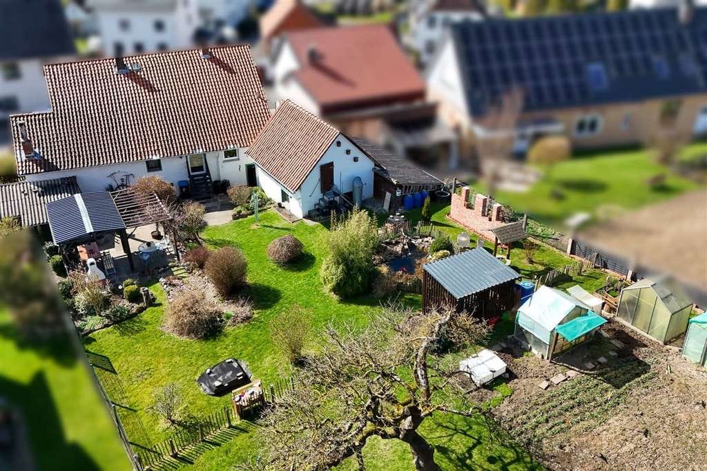 Immobilie in Kalefeld - Ihr neues Zuhause: Großzügiges Einfamilienhaus mit idyllischem Gartenparadies - Bild 4