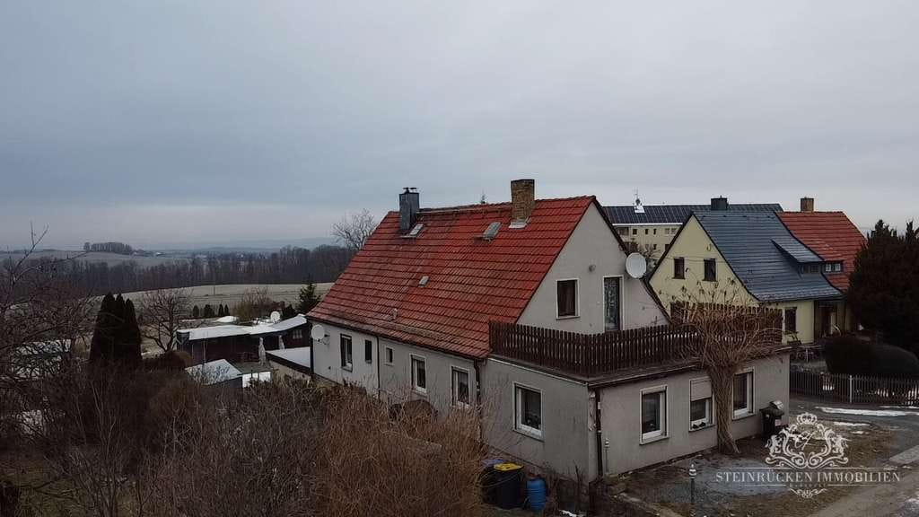 Immobilie in Dohna - Doppelhaushälfte mit weitem Blick und Zukunftsfläche - Bild 1