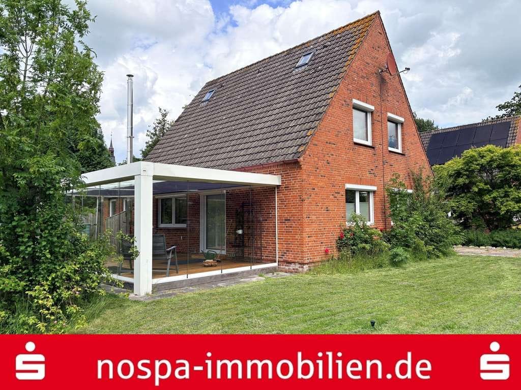 Immobilie in Tetenbüll - Ruhe & Komfort - Hochwertig ausgestattetes Einfamilienhaus in idyllischer Lage - Bild 0