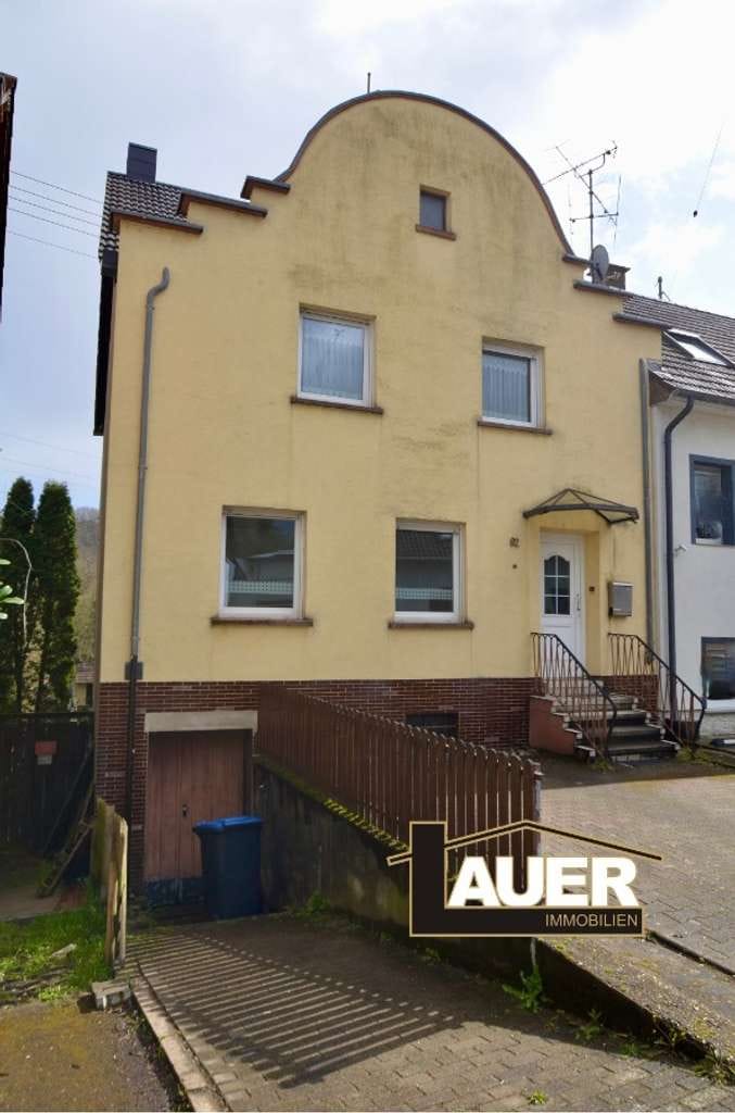 Immobilie in Großrosseln - Attraktives Einfamilienhaus mit durchdachter Raumaufteilung und liebevoll gepflegtem Garten - Bild 1