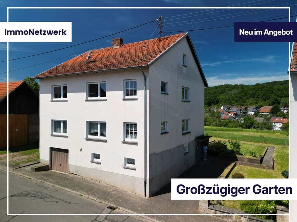 Immobilie in Krottelbach - Gartenparadies mit Weitblick – großzügiges Zweifamilienhaus in Krottelbach - Bild 0