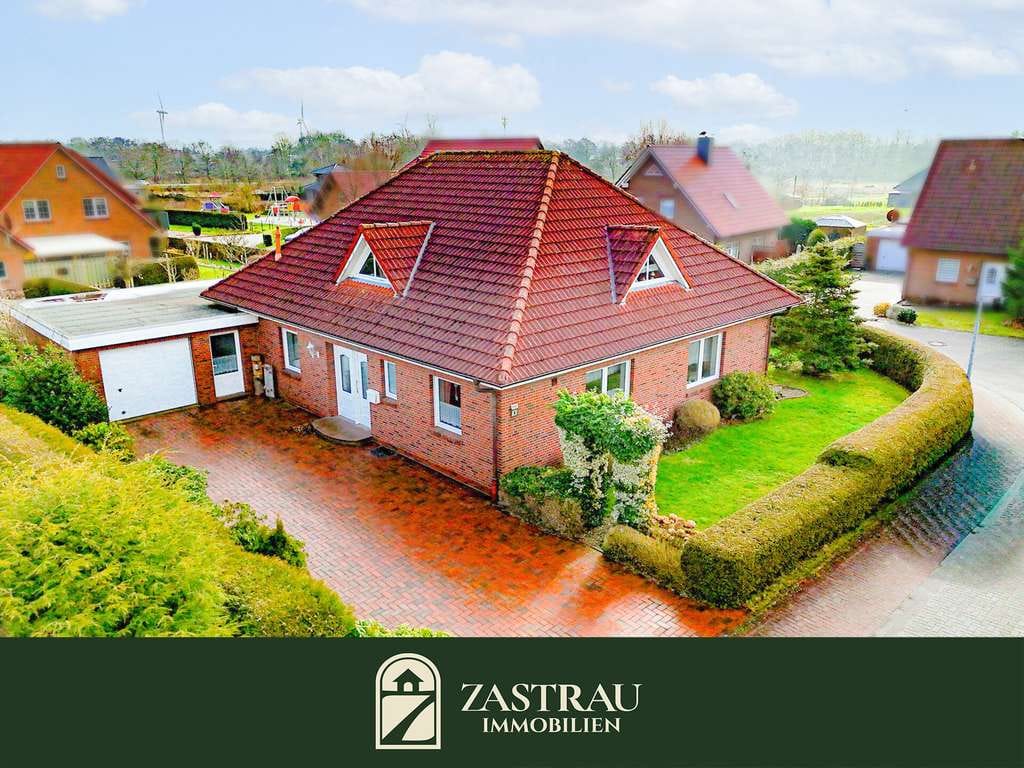 Immobilie in Westerholt - Gepflegter Bungalow in Ostfriesland mit Garage und Garten - Bild 0
