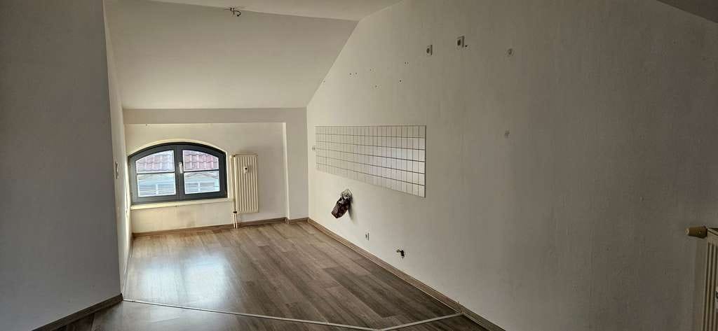 Immobilie in Mühlhausen - Willkommen über den Dächern von Mühlhausen – Eigentumswohnung in perfekter Altstadtlage - Bild 2