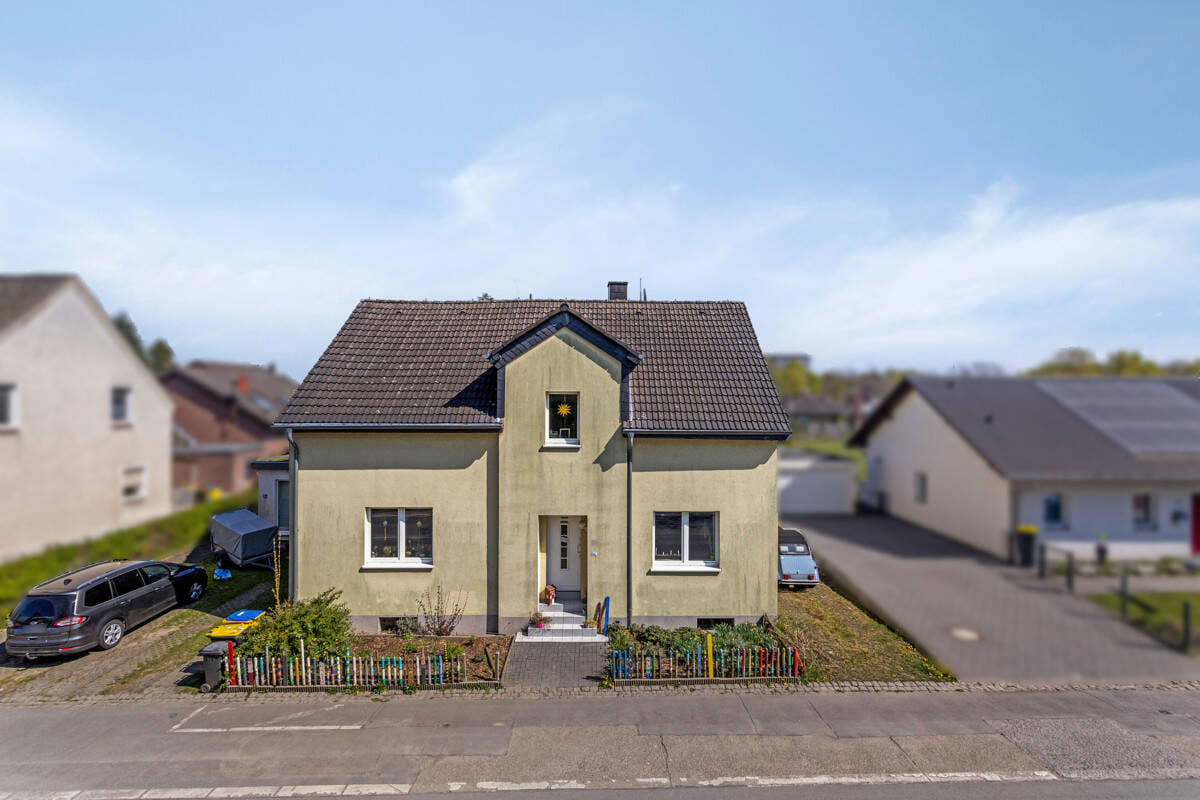 Immobilie in Kamen - Freistehendes Einfamilienhaus mit Einliegerwohnung und großem Garten! - Bild 1