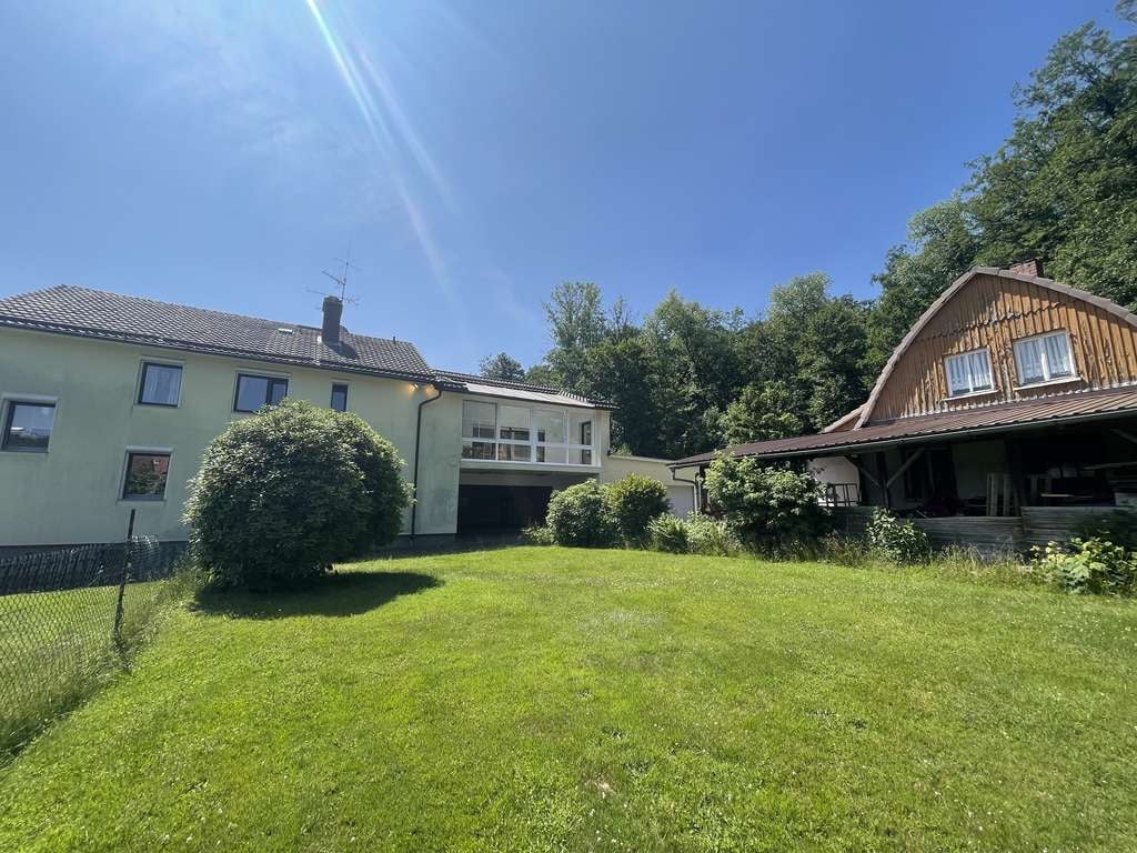 Immobilie in Grebenhain - Einfamilienhaus mit Gewerbeeinheit und Garagen in beliebter Lage von Hochwaldhausen! - Bild 4
