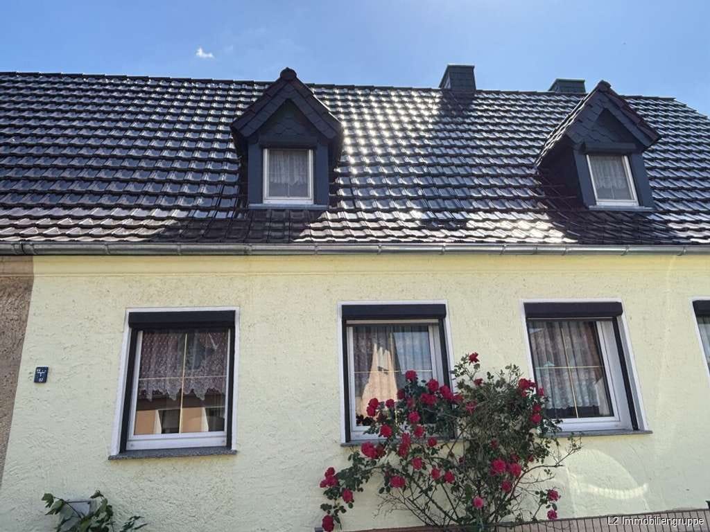 Immobilie in Röderaue - Gemütliche Doppelhaushälfte mit großem Grundstück und Doppelgarage in ruhiger Siedlungslage - Bild 2