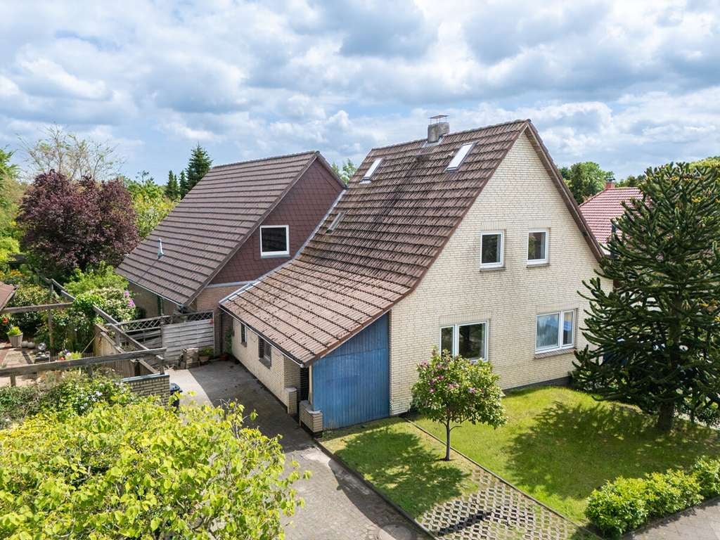 Immobilie in Schortens - Einfamilienhaus mit ELW oder Zweifamilienhaus auf großem Grundstück! - Bild 0