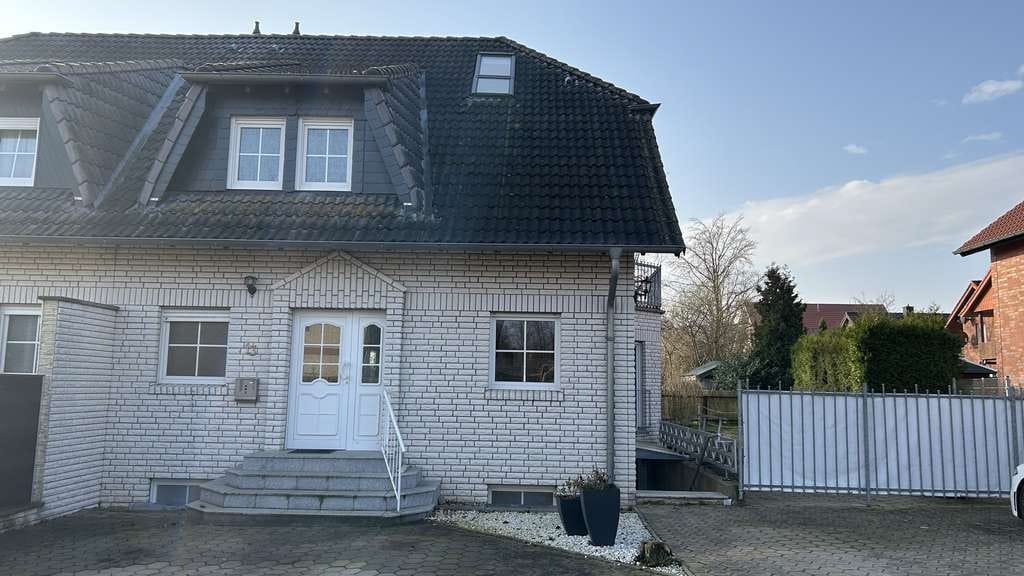 Immobilie in Melle - Doppelhaushälfte mit zwei Wohneinheiten in Melle-Buer. - Bild 0