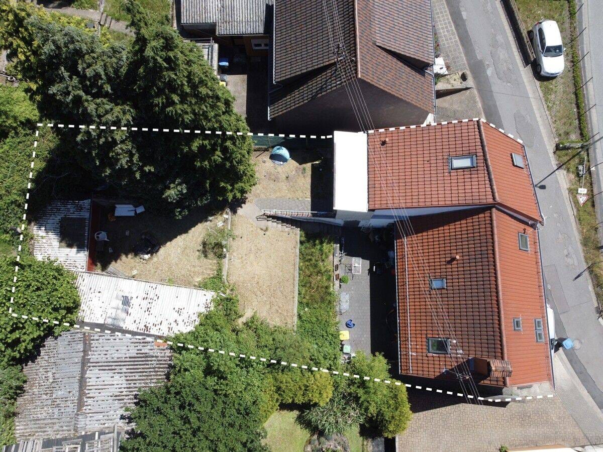 Immobilie in Wadern - Freistehendes Wohnhaus mit drei separat nutzbaren Wohneinheiten - Bild 2