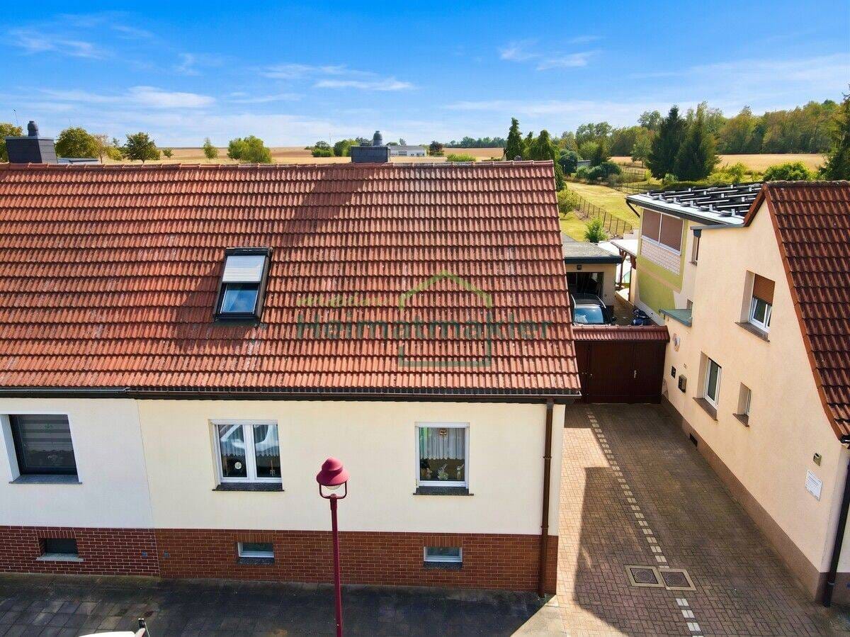 Immobilie in Nienburg (Saale) - Der Garten, von dem Familien träumen - Doppelhaushälfte in Latdorf - Bild 1