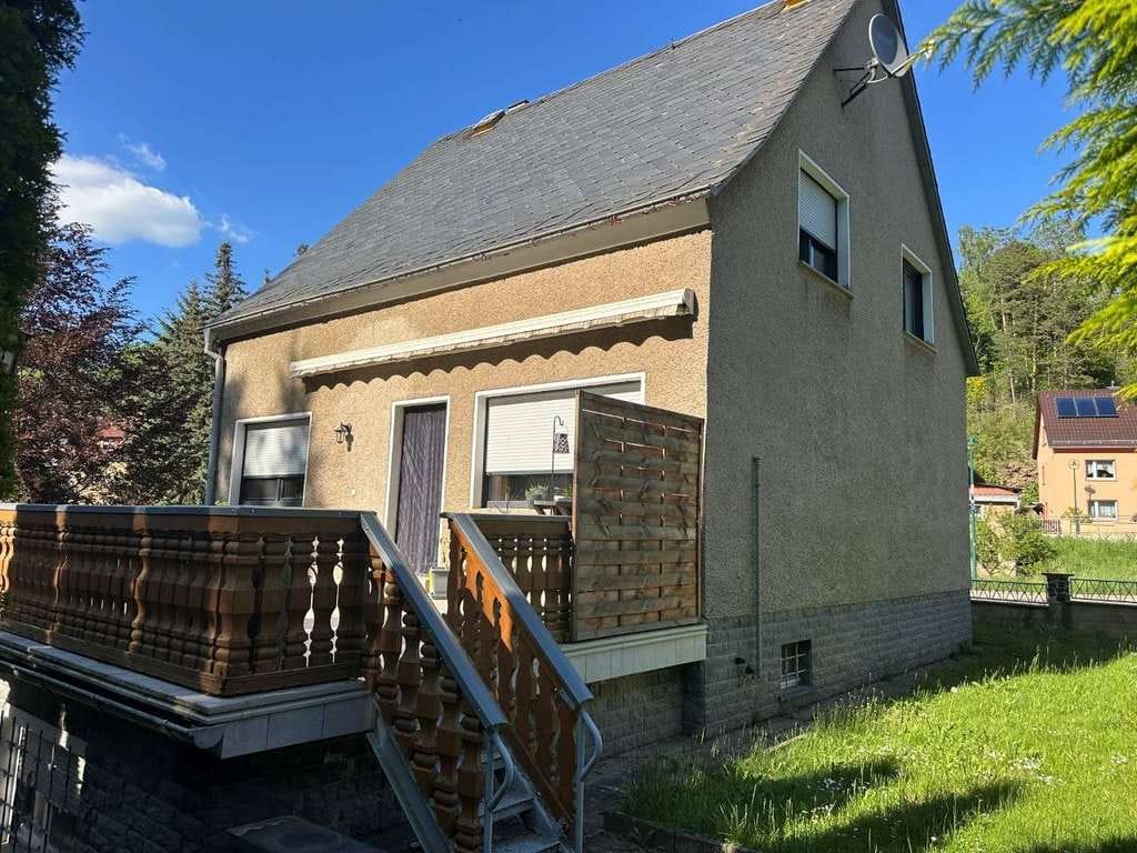 Immobilie in Unterwellenborn - Saniertes Einfamilienhaus mit zwei Garagen in guter Wohnlage - Bild 0