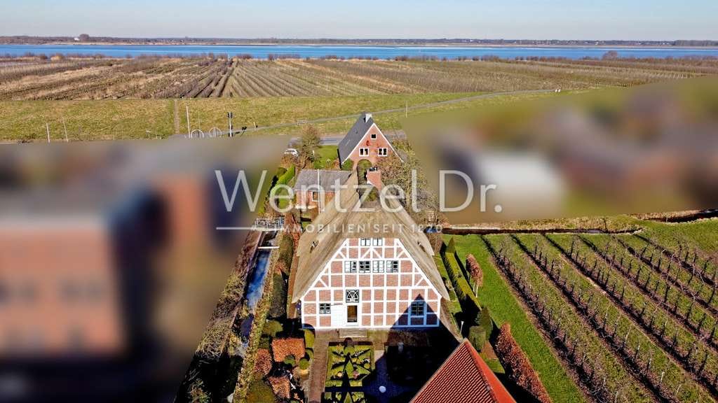Immobilie in Grünendeich - Einzigartiges und komplett saniertes Fachwerk-Juwel zum Kauf in Grünendeich - Wentzel Dr. - Bild 1