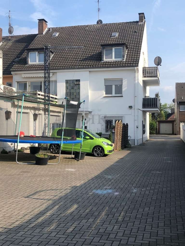 Immobilie in Dinslaken - Gepflegtes und gut vermietetes Mehrfamilienhaus mit Garagen und Carports in Dinslaken-Bruch! - Bild 4