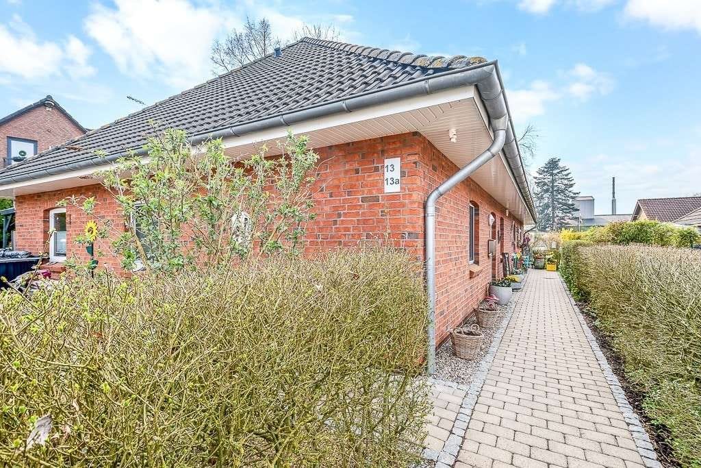 Immobilie in Süderlügum - Vermietete Doppelhaushälfte in Zentrumsnähe - Bild 1