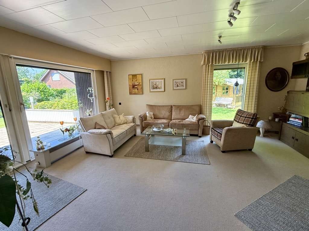 Immobilie in Coesfeld - Bungalow in ruhiger Sackgassenlage mit großem Westgrundstück, Keller und Garage - Bild 2