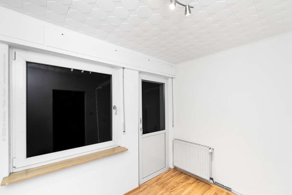 Immobilie in Langen - Vielseitiges Renditeobjekt: Gepflegtes Mehrgenerationenhaus mit drei Wohneinheiten und Ausbaureserve - Bild 4