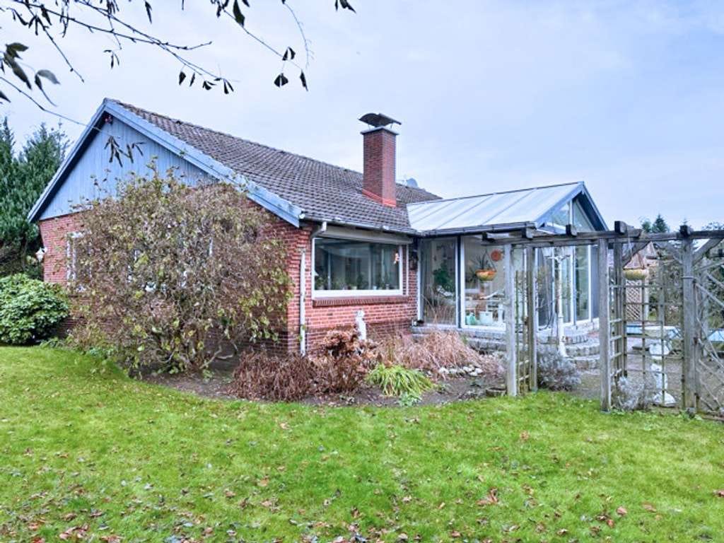 Immobilie in Lohe-Rickelshof - Ihr Haus in Lohe-Rickelshof: ebenerdiger Satteldach-Bungalow mit Einliegerwhg. in ruhiger Lage - Bild 3