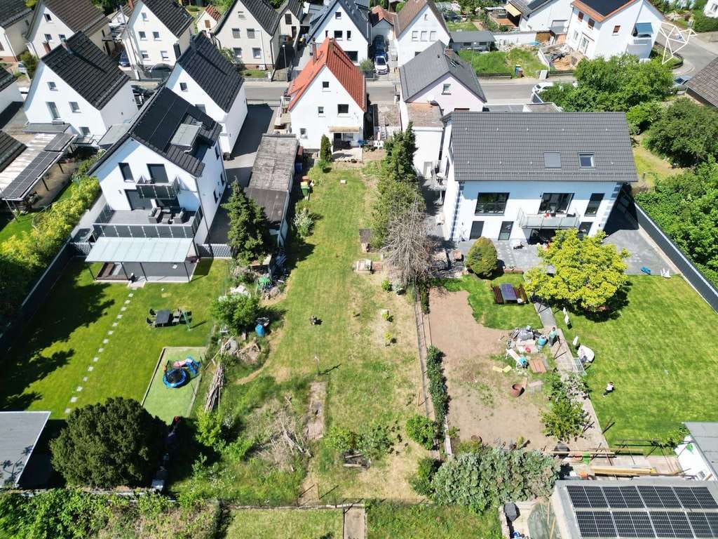 Immobilie in Raunheim - ENTWICKLUNGSPOTENTIAL 📈 Sanierungsbedürftiges Mehrfamilienhaus mit 790 m² Baugrundstück! - Bild 5