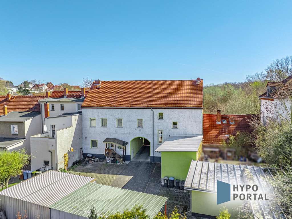 Immobilie in Teuchern - Vielseitiges Mehrfamilienhaus mit 4 Wohneinheiten und 1 Gewerbeeinheit in Teuchern - Bild 2