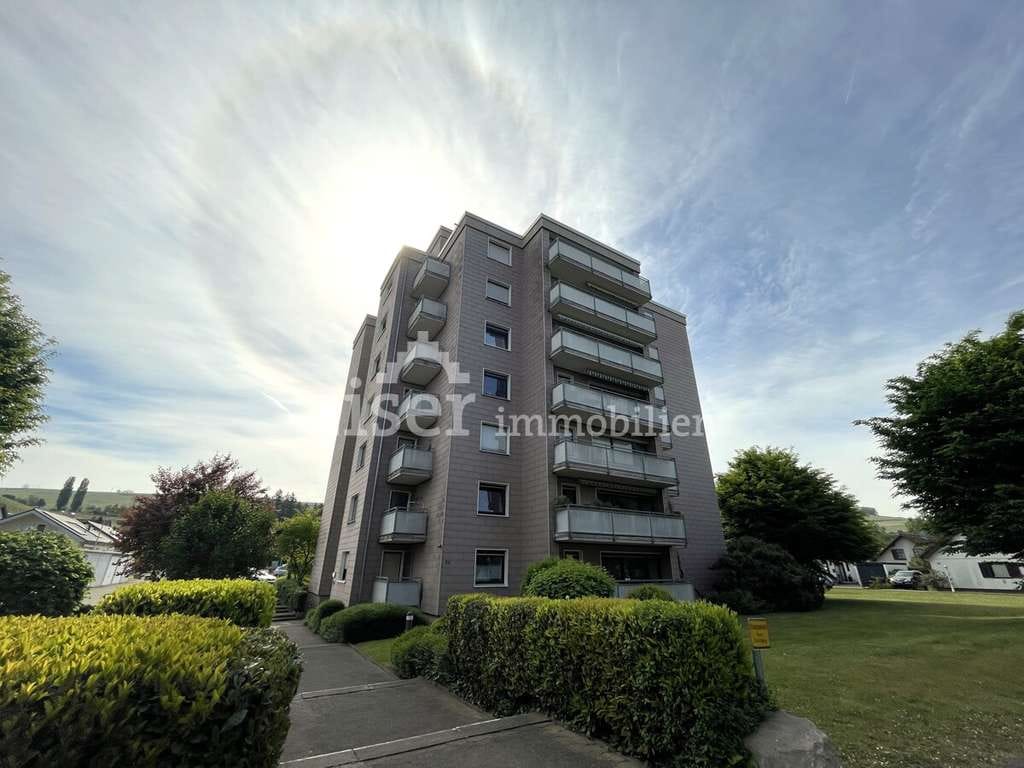 Immobilie in Auggen - Bezugsfreie 2,5-Zimmerwohnung inkl.2 Garagen - Bild 1