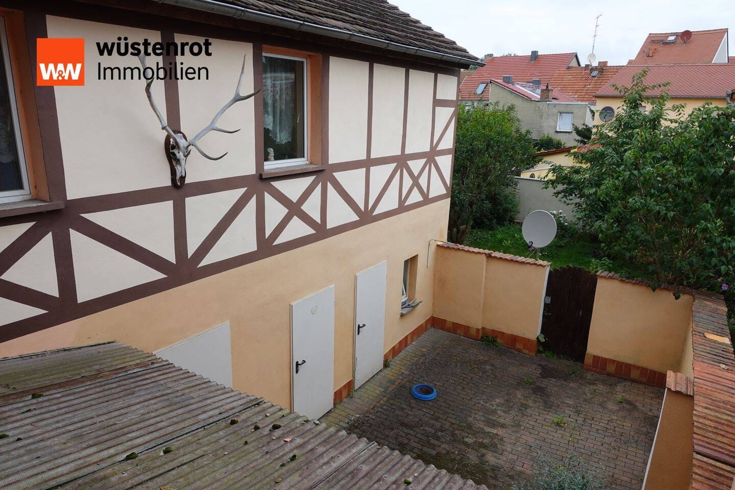 Immobilie in Wittichenau - Kulow - Charmantes Reihenmittelhaus mit Potenzial und gemütlichem Innenhof - Bild 0